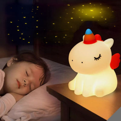 Veilleuse enfant licorne avec petit garçon qui dort profondément